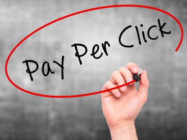 Man Hand writing Pay Per Click with marker on transparent wipe b