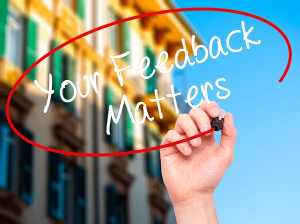 Man Hand writing Your Feedback Matters with black marker on visu — 스톡 사진