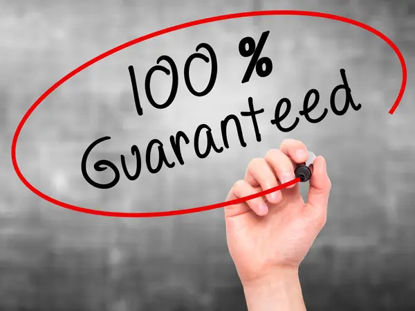 Man Hand writing 100 Percent Guaranteed with marker on transpare — Stock Photo, Image