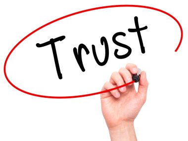 Man Hand writing Trust black marker on visual screen