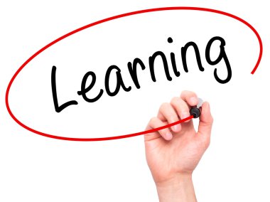 Man Hand writing Learning with marker on transparent wipe board