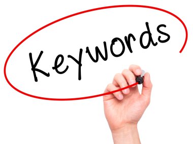 Man hand writing Keywords on visual screen