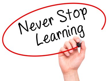 Man hand writing Never Stop Learning on visual screen