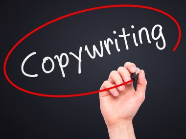 Man hand writing Copywriting on visual screen