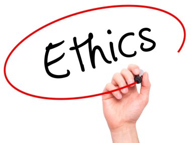 Man hand writing Ethics on visual screen