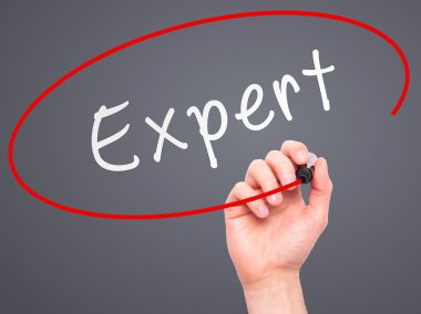 Man hand writing Expert on visual screen