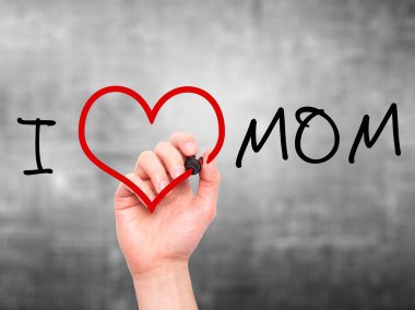 Man hand writing I Love Mom on visual screen