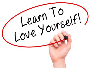 Man Hand writing Learn To Love Yourself with marker on transpare