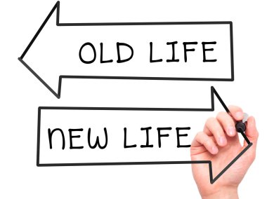 Man hand writing Old Life or New Life on visual screen