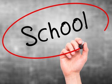 Man Hand writing School with marker on transparent wipe board