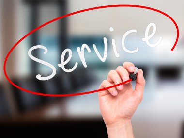Man hand writing Service on visual screen