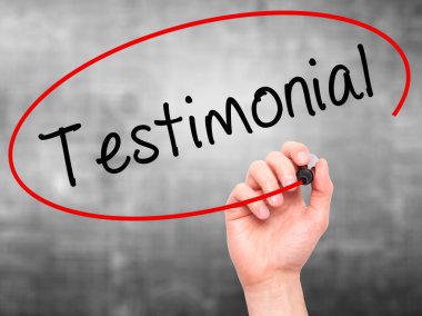 Man hand writing Testimonial on visual screen