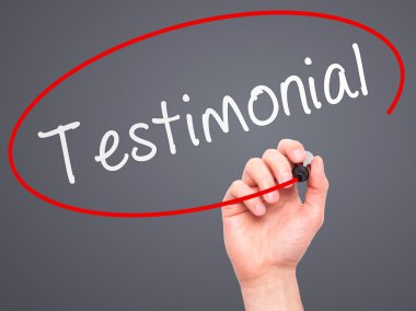 Man hand writing Testimonial on visual screen