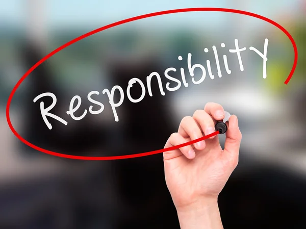 Man hand writing Responsibility on visual screen — Stok fotoğraf