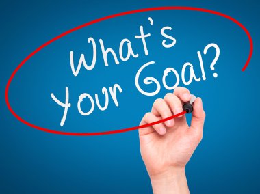 Man hand writing Whats Your Goal on visual screen