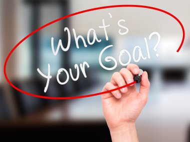 Man hand writing Whats Your Goal on visual screen