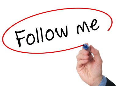 Man Hand writing Follow Me with marker on visual screen