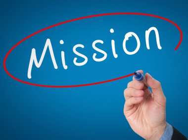Hand writing Mission with marker on virtual screen