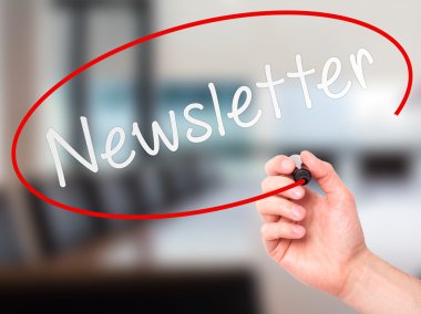 Man Hand writing Newsletter on visual screen