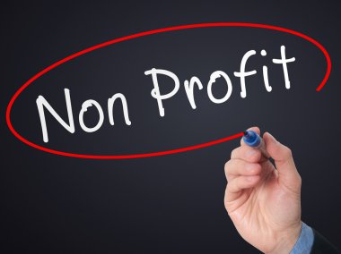 Man Hand writing Non Profit with marker on virtual screen