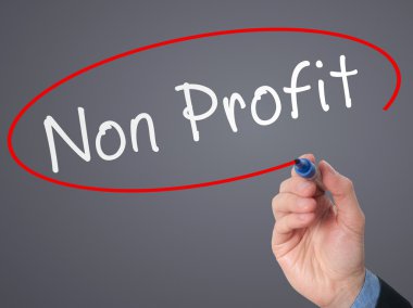 Man Hand writing Non Profit with marker on virtual screen