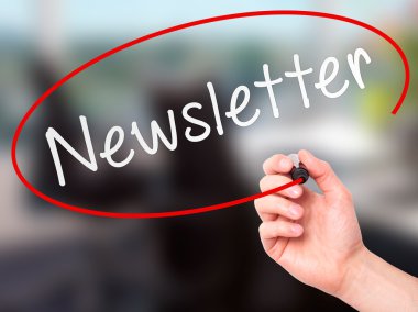Man Hand writing Newsletter on visual screen