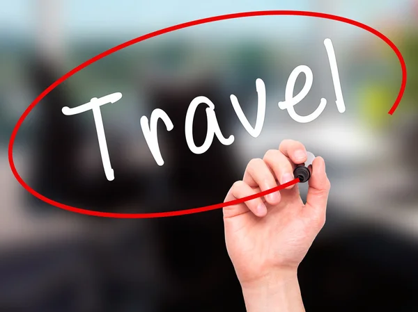 Man Hand writing Travel  with black marker on visual screen — Stock Photo, Image