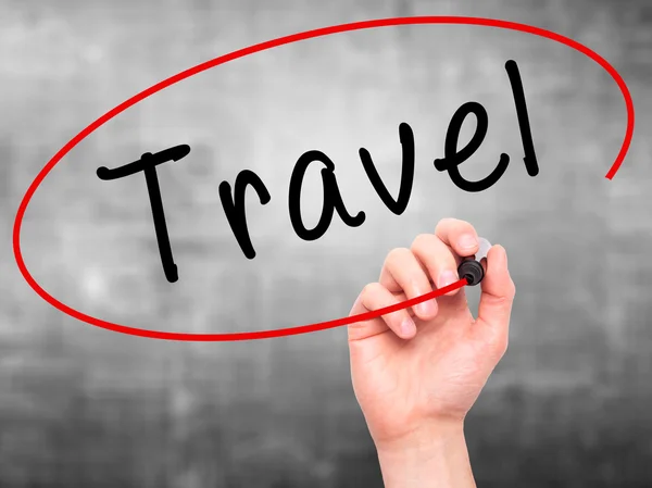Man Hand writing Travel  with black marker on visual screen — Stock Photo, Image