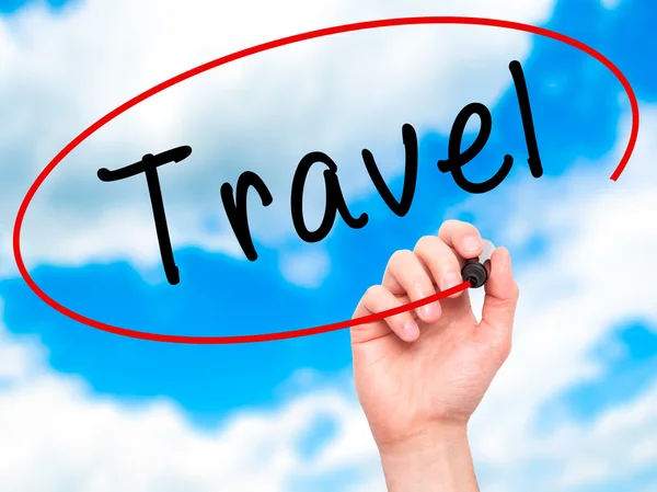 Man Hand writing Travel  with black marker on visual screen — Stock Photo, Image