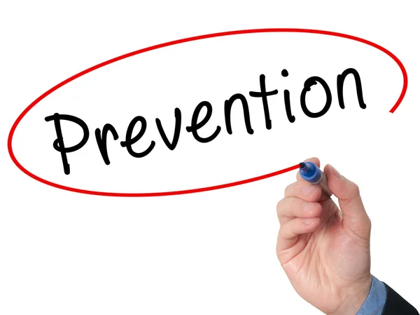 Man Hand writing Prevention with marker on visual screen — Stockfoto