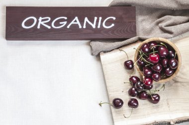 Fresh Cherries On The Wooden Boat