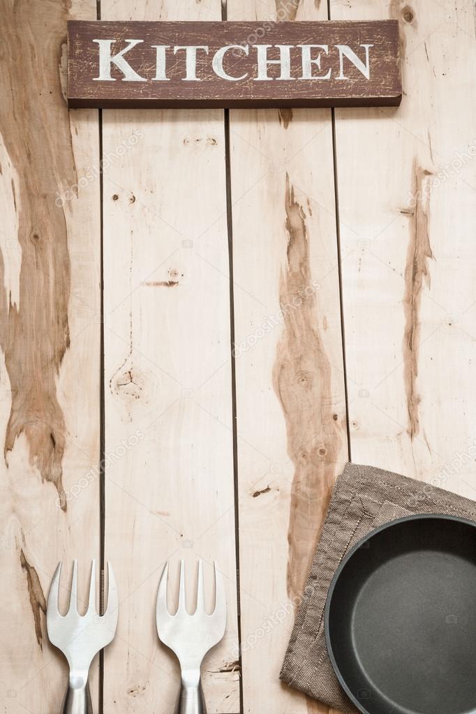 Kitchen Tools On The Wooden Desk