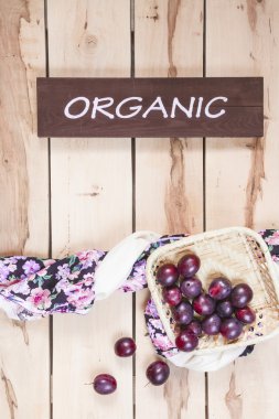Ripe seasonal apples on the wooden backround