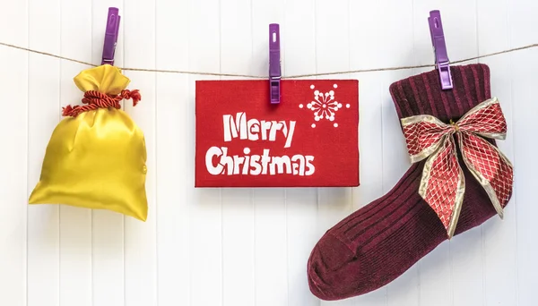 Noel arka plan. Kırmızı dekorasyon. Neşeli Noel tebrik kartı
