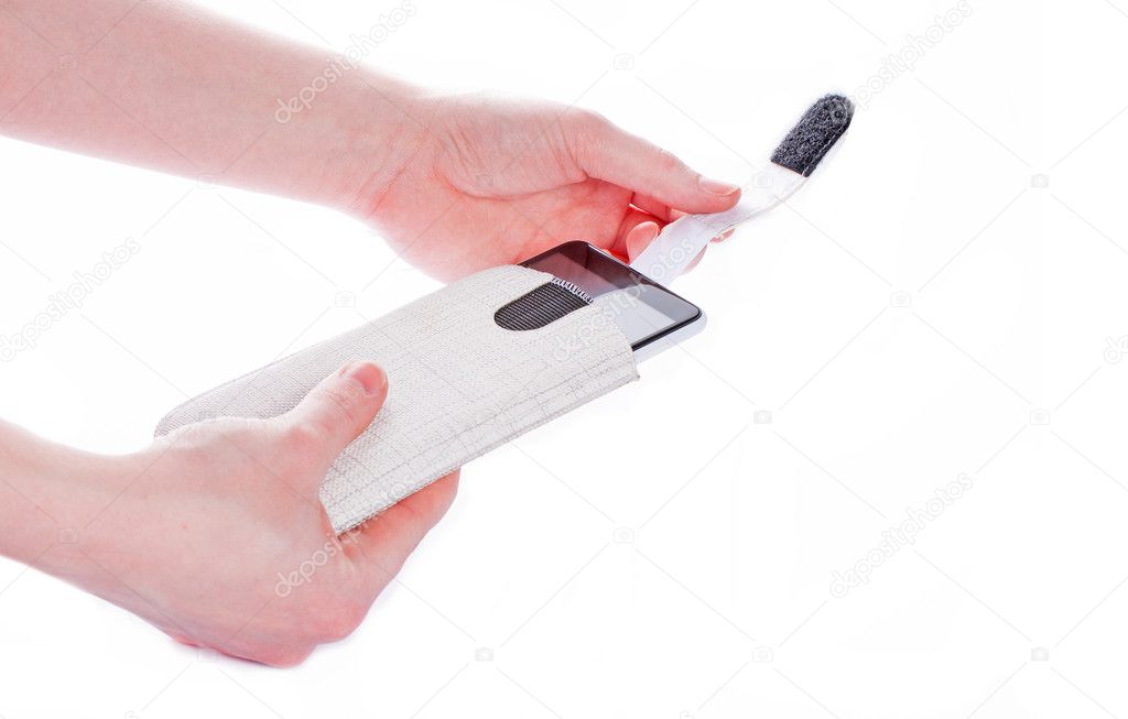 Mobile phone case in hands on white background