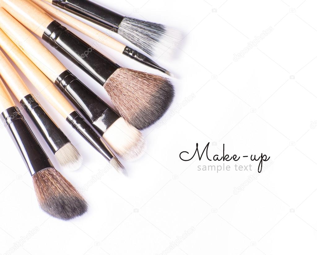 Makeup brushes on white background with sample text