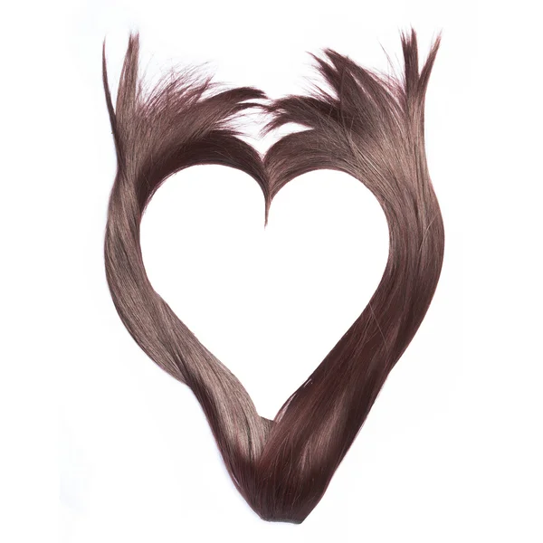 Forma de corazón de hermoso cabello castaño, aislado sobre fondo blanco — Foto de Stock