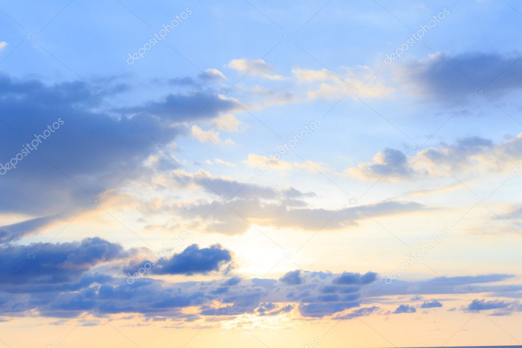 A soft cloud background with a pastel color blue to orange gradi