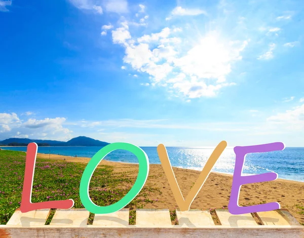 Word Love with old wood table and Nice white cloud on the sky on — Stock Photo, Image