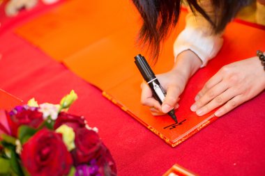 guests signing on the guestbook in a wedding clipart