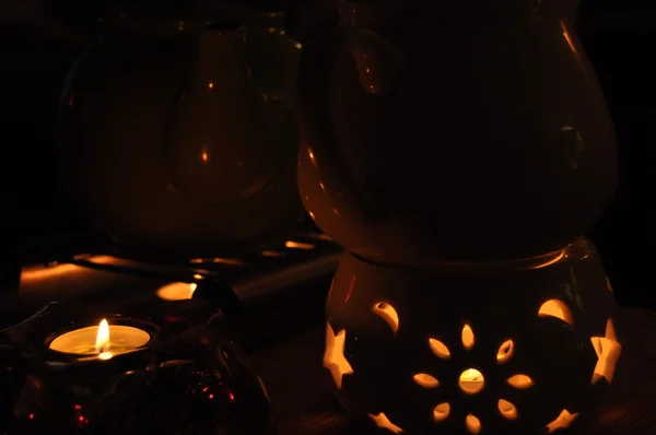 Heating tea kettle, teapot standing over the fire. Heated drink. — Stock Photo, Image