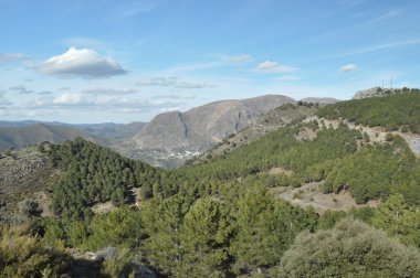 Sierra Nevada mountains in southern Spain, near Pradollano. Snow-capped peaks. clipart