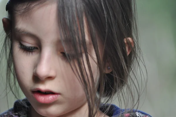 Portrait of a teenager. Brunette with long hair. — Stock Photo, Image