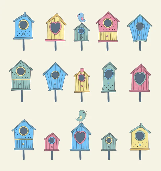 Elle çizilmiş kuş evleri bir dizi — Stok Vektör