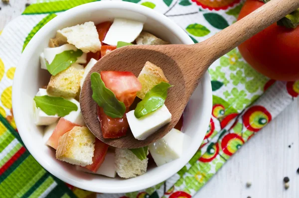 Salad with tomatoes and mozzarella — Stock Photo, Image