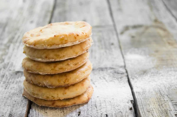 Hembakade kakor. Bilder på en trä bakgrund — Stockfoto