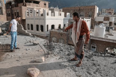 Taiz / Yemen - 22 Aug 2016 : A Yemeni looks at the destruction caused by a shell fired by the Houthi militia at his home in the Yemeni city of Taiz clipart