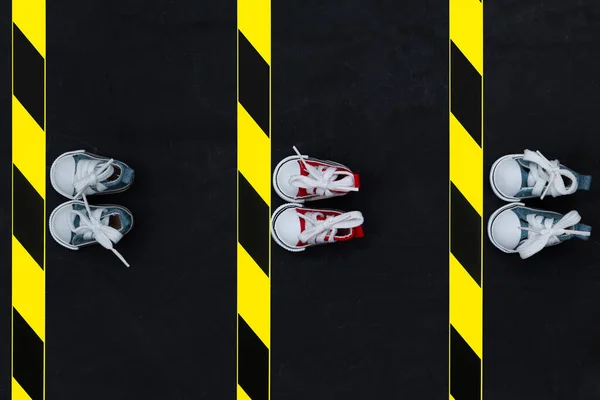 Social Distancing Concept Sneakers Warning Tape Asphalt Background Copy Space — Stock Photo, Image