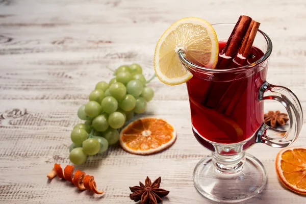 Mulled wine on a white wooden background — Stock Photo, Image