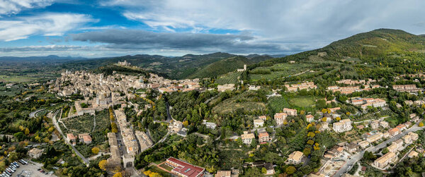 An aerial view of Assisi Rocca Minore and Maggiore, medieval town with city walls in Umbria Italy